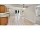 Wet bar with granite countertop and tile flooring at 230 W Spring Lake Dr, Altamonte Springs, FL 32714
