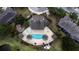 Community pool and surrounding areas from above at 2394 Caravelle Cir, Kissimmee, FL 34746