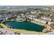 Wide aerial view of the community and surrounding area at 2394 Caravelle Cir, Kissimmee, FL 34746