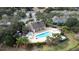 Community pool, playground and clubhouse at 2394 Caravelle Cir, Kissimmee, FL 34746