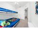 Bedroom with bunk beds and superhero bedding at 2394 Caravelle Cir, Kissimmee, FL 34746
