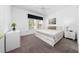 Bedroom with king-size bed and ensuite bathroom at 2394 Caravelle Cir, Kissimmee, FL 34746