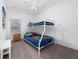 Bedroom with bunk beds and superhero bedding at 2394 Caravelle Cir, Kissimmee, FL 34746