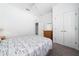 Bright bedroom with a double bed and built-in closet at 2394 Caravelle Cir, Kissimmee, FL 34746