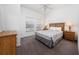 Bedroom with double bed, nightstands, and window blinds at 2394 Caravelle Cir, Kissimmee, FL 34746