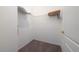 Walk-in closet with wire shelving and carpeting at 2394 Caravelle Cir, Kissimmee, FL 34746