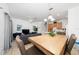 Open dining room with kitchen and living room views at 2394 Caravelle Cir, Kissimmee, FL 34746