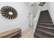 Entryway with staircase, bench, and wall decor at 2394 Caravelle Cir, Kissimmee, FL 34746
