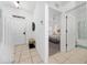 View of entryway, bedroom, and bathroom from hallway at 2394 Caravelle Cir, Kissimmee, FL 34746