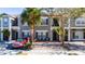 Front view of two-story townhome with gray siding at 2394 Caravelle Cir, Kissimmee, FL 34746