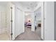 Hallway with access to bedrooms and bathrooms at 2394 Caravelle Cir, Kissimmee, FL 34746