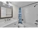 Updated bathroom with a bathtub and modern fixtures at 3203 Westridge Blvd # 102, Orlando, FL 32822