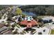 Community features a clubhouse, pool, lake and surrounding homes at 334 Orange Cosmos Blvd, Davenport, FL 33837