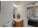 Clean bathroom with single vanity and toilet at 334 Orange Cosmos Blvd, Davenport, FL 33837