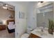 Clean bathroom with single vanity and toilet at 334 Orange Cosmos Blvd, Davenport, FL 33837