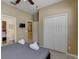 Bedroom with queen bed and direct access to bathroom at 334 Orange Cosmos Blvd, Davenport, FL 33837