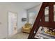 bedroom with bunk beds, armchair, and ensuite bathroom access at 334 Orange Cosmos Blvd, Davenport, FL 33837