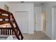 Bedroom with a bunk bed and access to a hallway at 334 Orange Cosmos Blvd, Davenport, FL 33837