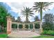 Watersong community entrance with a fountain and landscaping at 334 Orange Cosmos Blvd, Davenport, FL 33837