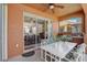 Outdoor patio with built-in grill, seating area, and view of the backyard at 334 Orange Cosmos Blvd, Davenport, FL 33837
