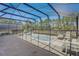 Relax and enjoy the screened-in pool and spa area at 334 Orange Cosmos Blvd, Davenport, FL 33837
