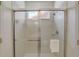 Large walk-in shower with glass enclosure at 334 Orange Cosmos Blvd, Davenport, FL 33837