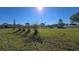 Vacant lot with a shed and grassy area at 3462 Dusk Ave, Kissimmee, FL 34744