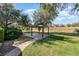 Charming gazebo with brick pavers next to a grassy lawn at 3518 Kilmarnock Dr, Apopka, FL 32712