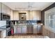 Bright kitchen, stainless steel appliances, and granite countertops at 3663 S Atlantic Ave # 11D, New Smyrna Beach, FL 32169