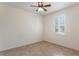 Simple bedroom with tile floors and window with shutters at 389 Mohave Terrace, Lake Mary, FL 32746