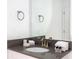 Bathroom with modern vanity, updated fixtures, and neutral color palette at 4355 Scene Ln, Kissimmee, FL 34746