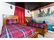 Two twin beds in a Hogwarts-themed bedroom with mural at 4355 Scene Ln, Kissimmee, FL 34746