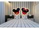 Mickey Mouse-themed bedroom with a king-size bed and themed decor at 4355 Scene Ln, Kissimmee, FL 34746
