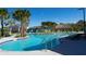 Serene lazy river with lush landscaping at 4355 Scene Ln, Kissimmee, FL 34746
