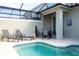 Private pool with patio furniture and plenty of space for relaxation at 4355 Scene Ln, Kissimmee, FL 34746