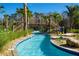 Resort-style pool with lounge chairs at 4355 Scene Ln, Kissimmee, FL 34746