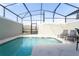 Private screened pool with lounge chairs at 4355 Scene Ln, Kissimmee, FL 34746