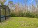 Spacious backyard surrounded by trees at 5181 Vista Lago Dr, Orlando, FL 32811