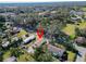 Aerial view of the home's neighborhood with mature trees at 5526 Lily Rd, Lakeland, FL 33811