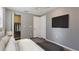 Bedroom with a closet, ceiling fan, and a modern minimalist style at 5526 Lily Rd, Lakeland, FL 33811