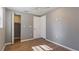 Neutral bedroom features a closet and natural light at 5526 Lily Rd, Lakeland, FL 33811