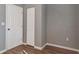 Bedroom with closet and wood-look floors at 5526 Lily Rd, Lakeland, FL 33811