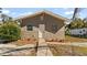Newly renovated house with a landscaped front yard at 5526 Lily Rd, Lakeland, FL 33811