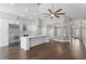 Modern kitchen with stainless steel appliances and white cabinetry at 1027 Sweetbrook Way, Orlando, FL 32828