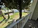 Private balcony with view of courtyard and landscaping at 11538 Westwood Blvd # 226, Orlando, FL 32821