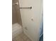 Neutral-colored tile bath tub and towel rack at 11538 Westwood Blvd # 226, Orlando, FL 32821
