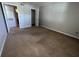 Bright bedroom with neutral walls and carpeting at 11538 Westwood Blvd # 226, Orlando, FL 32821