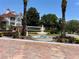 Lexington Place community entrance with fountain and brick pavers at 11538 Westwood Blvd # 226, Orlando, FL 32821