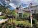 Exterior view of landscaping and signage around the clubhouse at 11538 Westwood Blvd # 226, Orlando, FL 32821