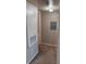 View of a hallway with carpeted floors and electrical panels on the wall at 11538 Westwood Blvd # 226, Orlando, FL 32821